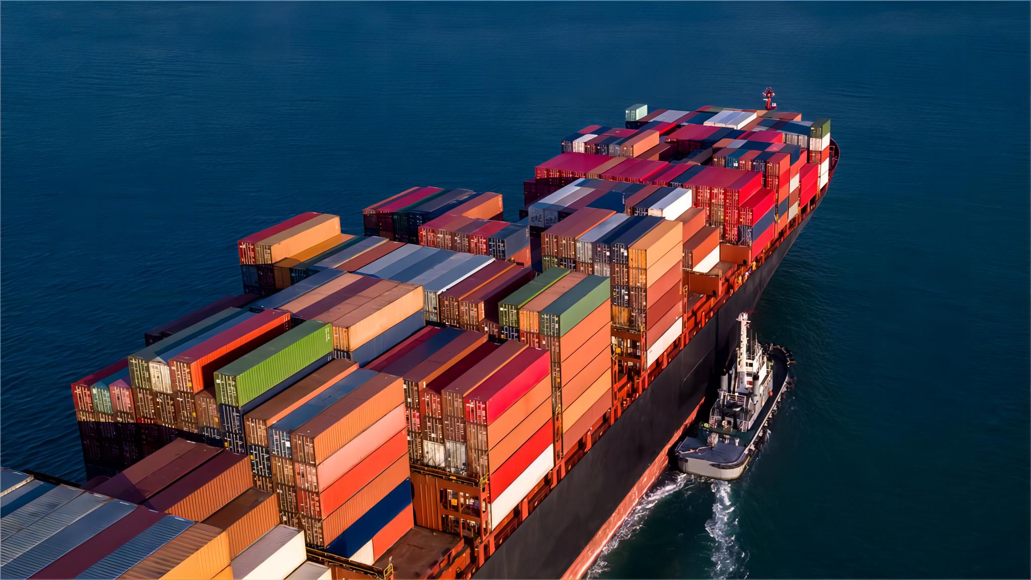 Modern freight train carrying containers across a landscape