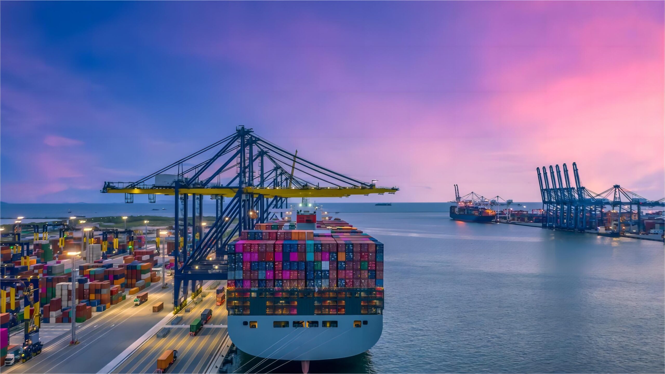 Heavy machinery being loaded into a 40GP container for shipping to Miami